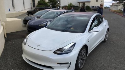 Tesla Model 3 white front three quarters left side spy shots