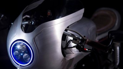 Royal Enfield Continental GT Silver Bullet by white collar bike headlight