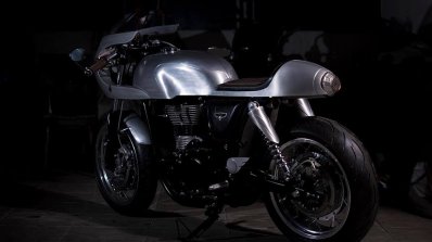 Royal Enfield Continental GT Silver Bullet by white collar bike rear left quarter