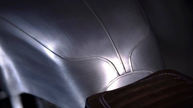 Royal Enfield Continental GT Silver Bullet by white collar bike tank