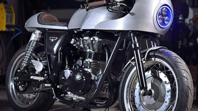 Royal Enfield Continental GT Silver Bullet by white collar bike