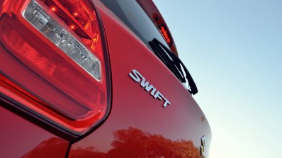 2018 Maruti Swift test drive review badge angle view