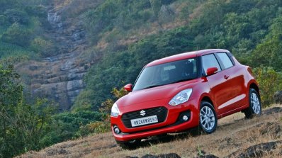 2018 Maruti Swift test drive review front three quarters tilt