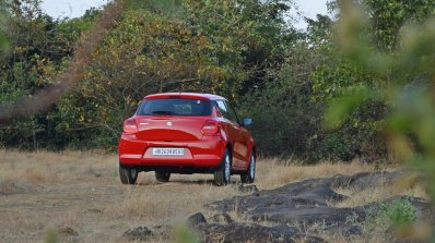 2018 Maruti Swift test drive review rear three quarters far