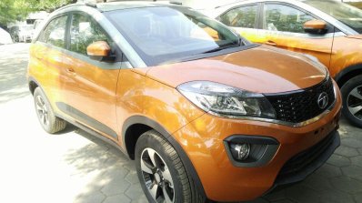 Tata Nexon AMT front three quarters dealership stockyard