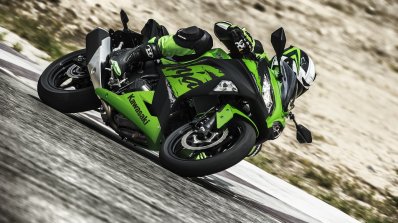 Kawasaki Ninja 300 2018 green riding front quarter