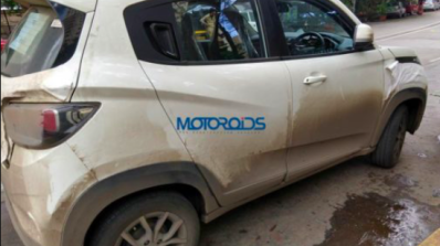 Mahindra Kuv100 Nxt Amt Rear Three Quarters Image