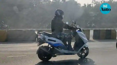 Suzuki Burgman Electric Spy Shot Rhs