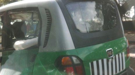 Spied - IAB reader snaps the Bajaj RE60 with plastic curtains