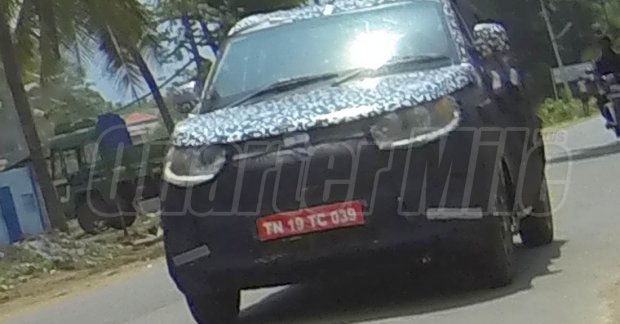 Mahindra S101 test mule gains headlamps, new body panels