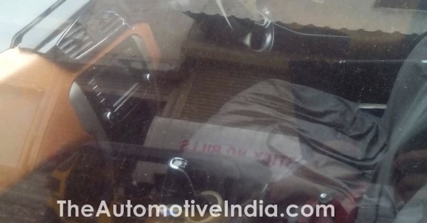 Tata Bolt with an orange dashboard snapped inside out