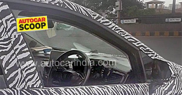 Tata X451's (Maruti Baleno rival) interior spied for the 