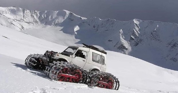 Modified Maruti Gypsy with tank tracks takes on a snow 