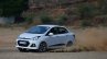 Hyundai Xcent Review side cornering shot