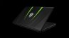 Koenigsegg and Razer Blade Laptop front quarter