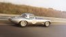 Lightweight Jaguar E-Type press image on track profile