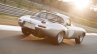 Lightweight Jaguar E-Type press image on track rear right three quarter