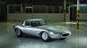 Lightweight jaguar E-Type press image on factory floor front three quarter (2)