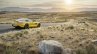 Mercedes AMG GT press image yellow rear three quarter