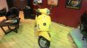 Vespa VX front yellow at Nepal Auto Show 2015