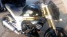 Mahindra Mojo black front quarter spotted