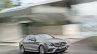 2016 Mercedes E-Class E 400 4MATIC front three quarters in motion selenit grey magno