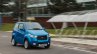 UK-spec Mahindra e2o front three quarters in motion