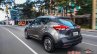 Nissan Kicks official image rear three quarters urban driving shot