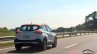 Nissan Kicks rear three quarters driving shot