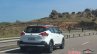 Nissan Kicks rear three quarters in motion