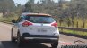 Nissan Kicks rear three quarters left side in motion