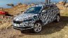 Skoda Karoq front three quarters left side camouflaged