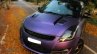 Maruti Swift matte purple wrap and sporty body kit front quarter