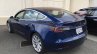 Tesla Model 3 blue rear three quarters spy shot