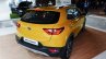 Kia Stonic rear three quarters yellow