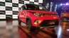 Mahindra KUV100 NXT Red & Black front three quarters