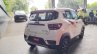 Mahindra KUV100 NXT white accessorised rear three quarters