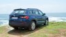 Skoda Kodiaq test drive review right rear three quarters beach