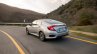 2018 Honda Civic diesel rear three quarters left side dynamic highway shot