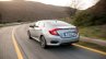 2018 Honda Civic diesel rear three quarters left side dynamic image