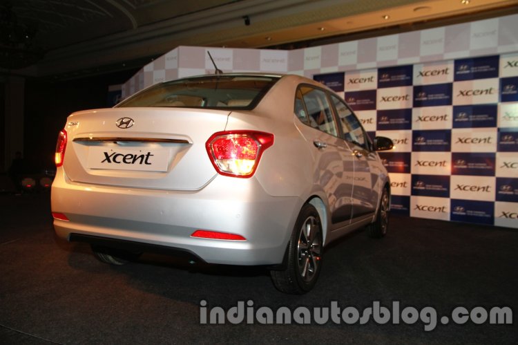 Hyundai Xcent rear three quarters exterior