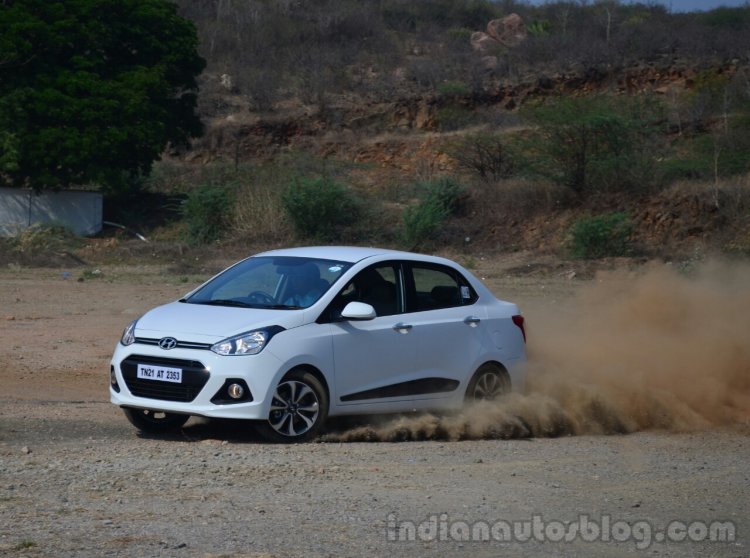 Hyundai Xcent Review side cornering shot