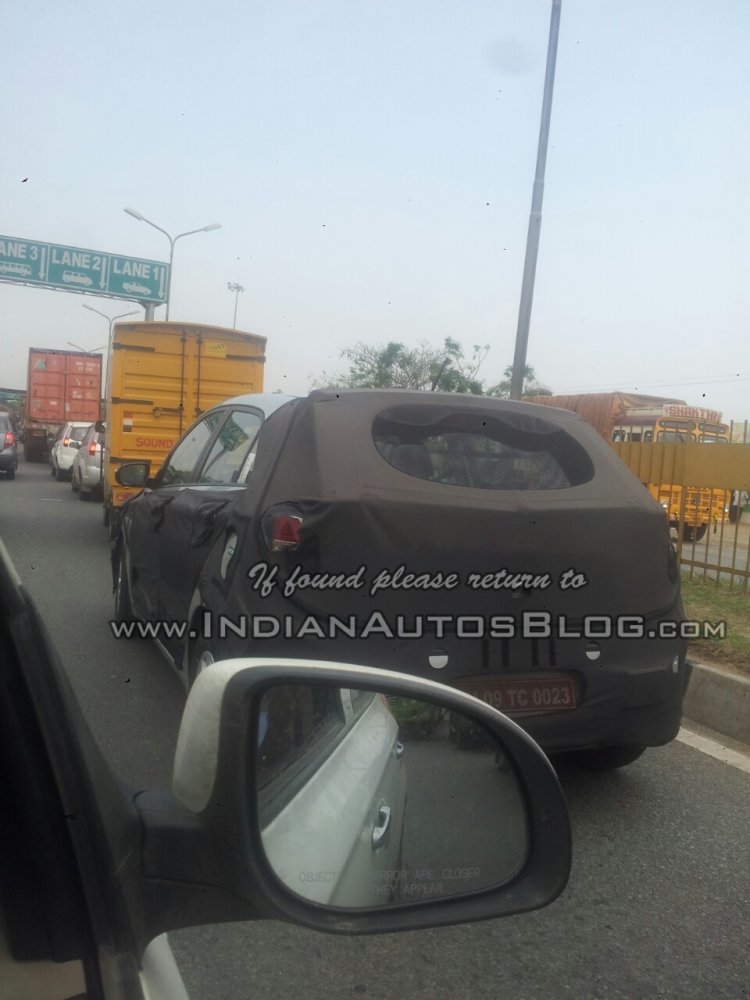 2015 Hyundai i20 with a camouflaged Maruti Swift i20