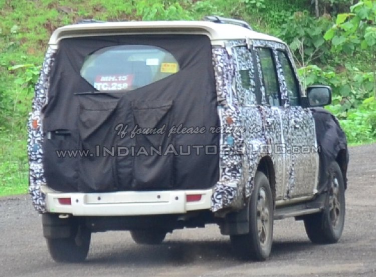 Mahindra Scorpio facelift spied rear three quarters