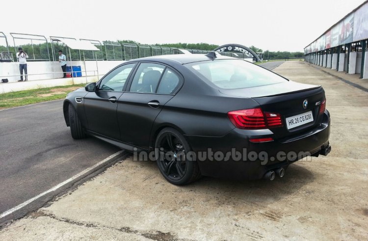 BMW M5 facelift rear three quarters left in India