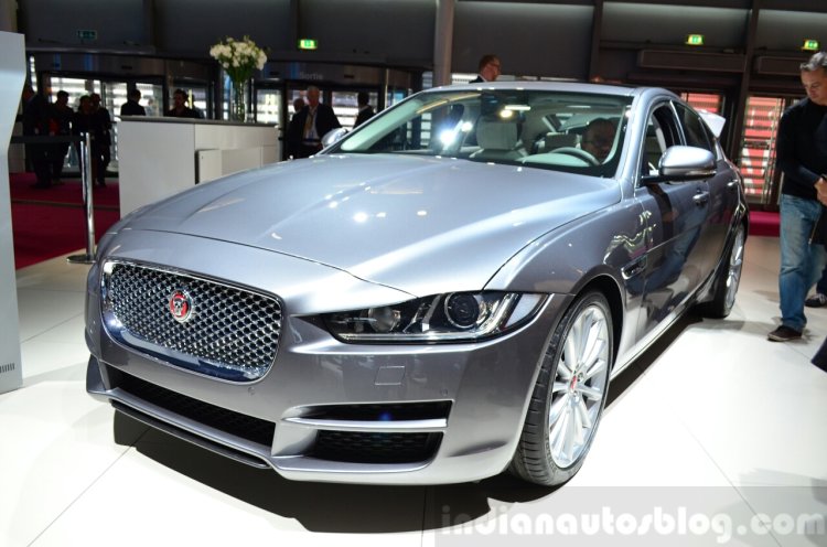 Jaguar XE front three quarters left at the 2014 Paris Motor Show