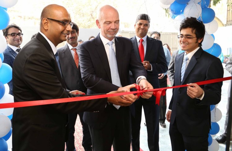 Nigel Harris, President, Ford India with the Directors of Eminent Auto Delhi