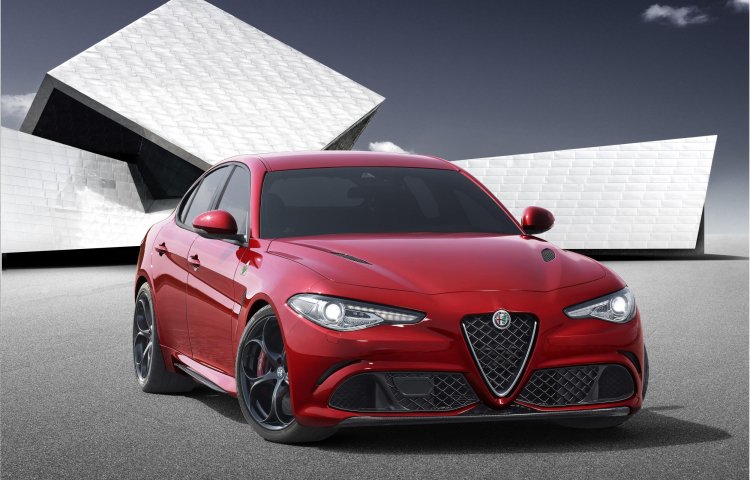 2016 Alfa Romeo Giulia front three quarter unveiled press shot