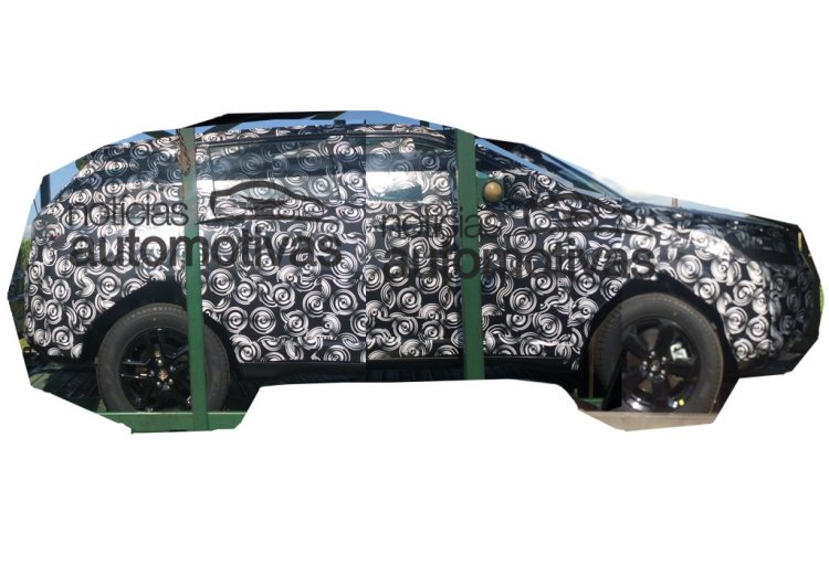 2016 Jeep Compact SUV side spotted on a carrier