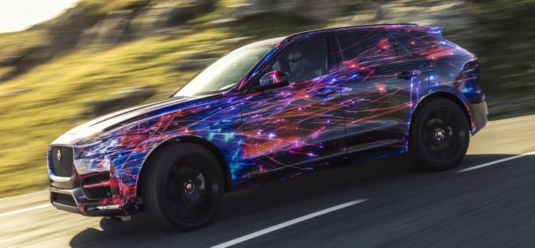 Jaguar F-Pace side view in motion (test prototype)